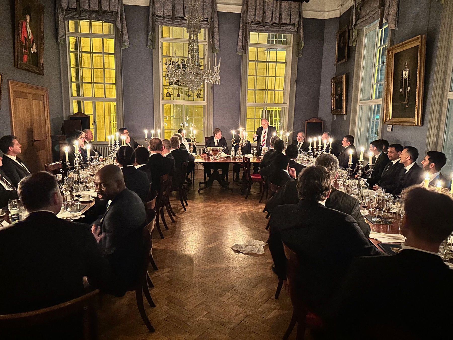 A speech after dinner in the candle-lit Livery Hall